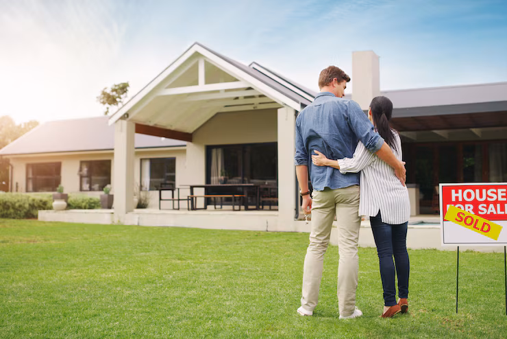its-all-ours-shot-young-couple-admiring-their-newly-purchased-house_590464-15016